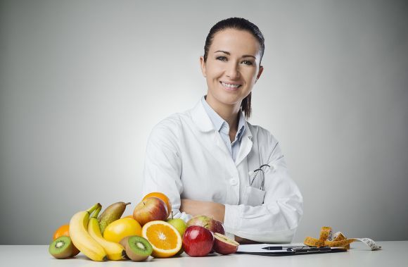 Female Nutritionist with Fruits and Veggies